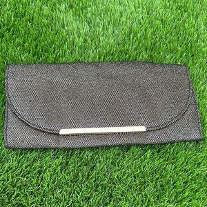 Call It Spring Metallic Black/Gold Glitter Clutch